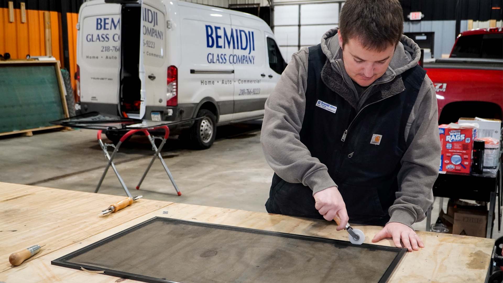 Bemidji Glass Company installing a window in Northern Minnesota
